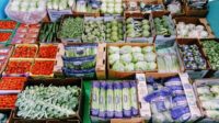 Overhead image of multiple containers of produce.