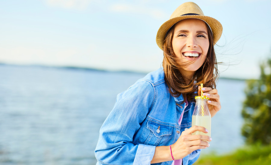 Woman with beverage_Getty