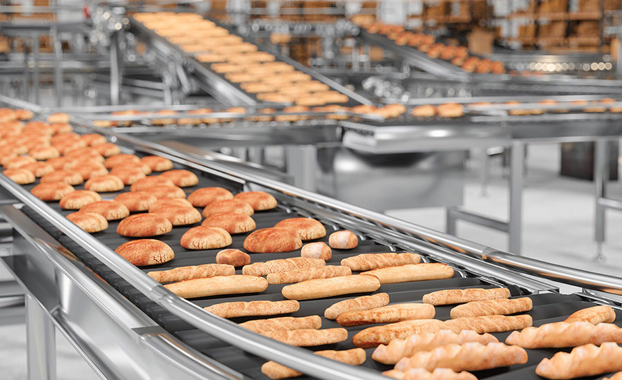 closeup of racks of baked goods in a factory